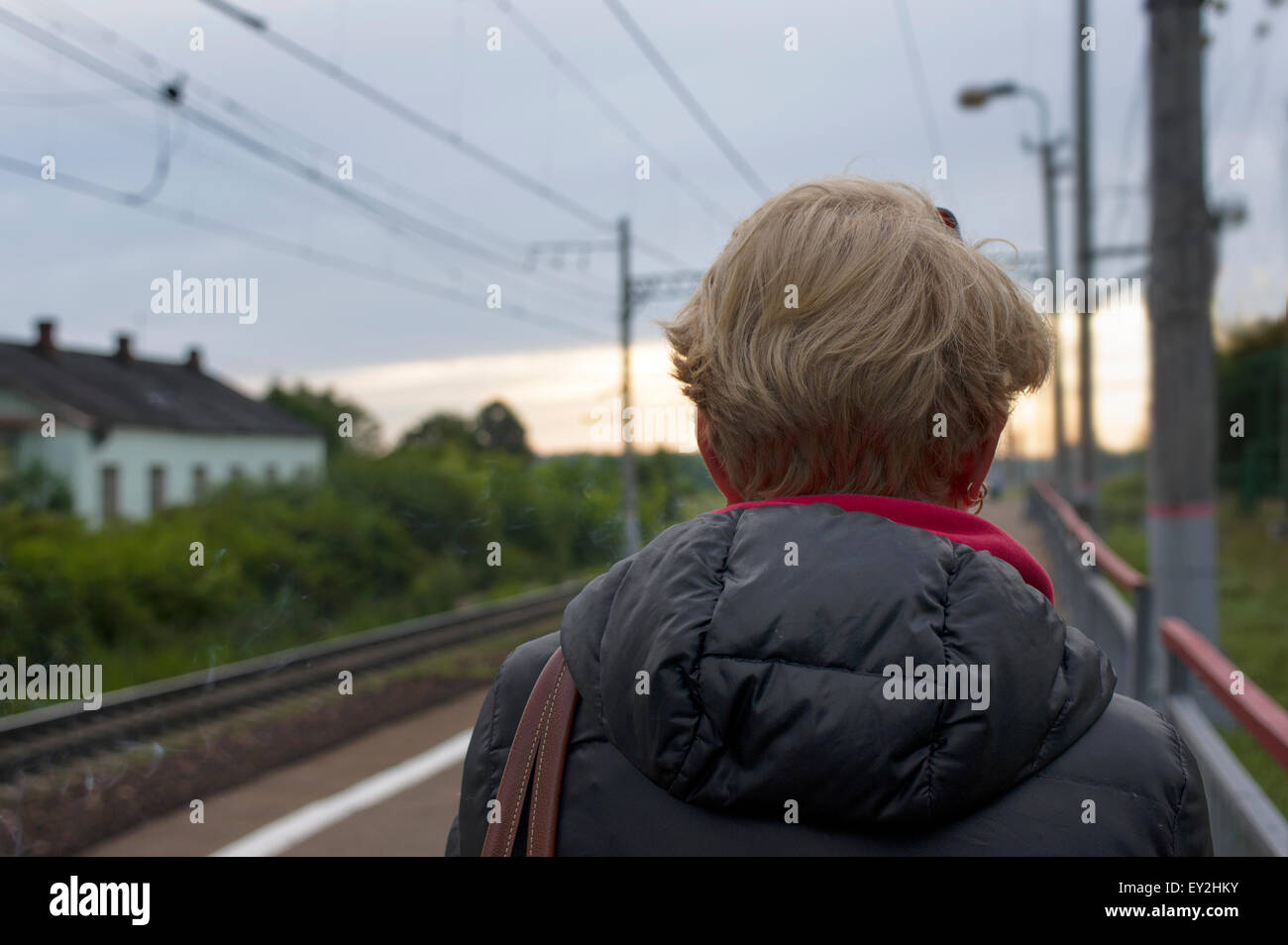 Train platform waiting back hi-res stock photography and images - Alamy