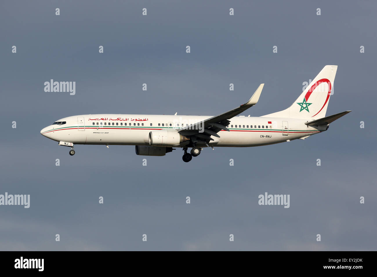 Madrid, Spain - March 3, 2015: A Royal Air Maroc Boeing 737-800 with the registration CN-RNJ approaches Madrid Airport (MAD) in Stock Photo