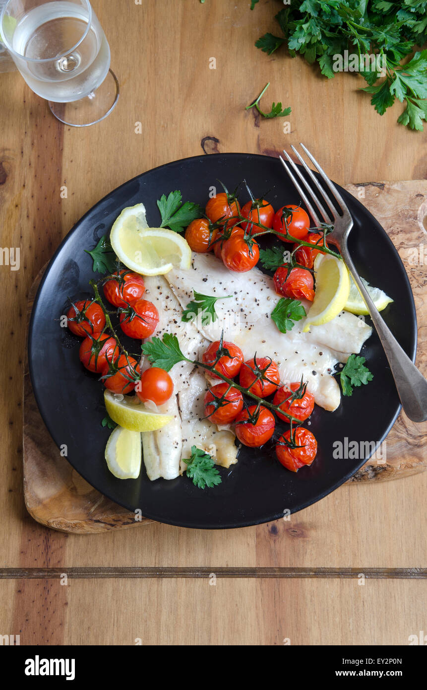 Sea bass with olive and caper tapenade Stock Photo Alamy