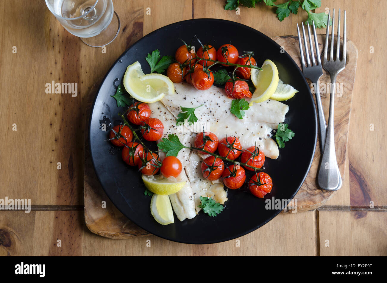 Sea bass with olive and caper tapenade Stock Photo Alamy