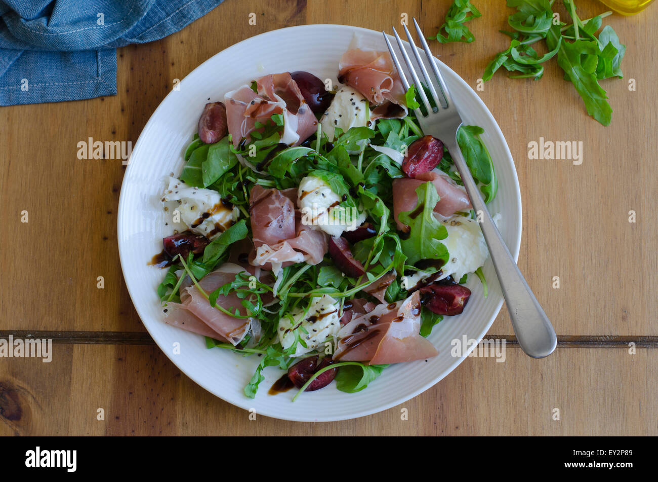 Cherry, mozzarella, rocket and Parma ham salad Stock Photo Alamy