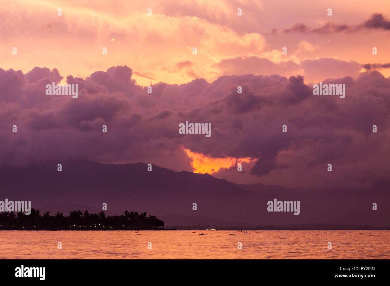 Vibrant tropical sunset at Bali indonesia Stock Photo