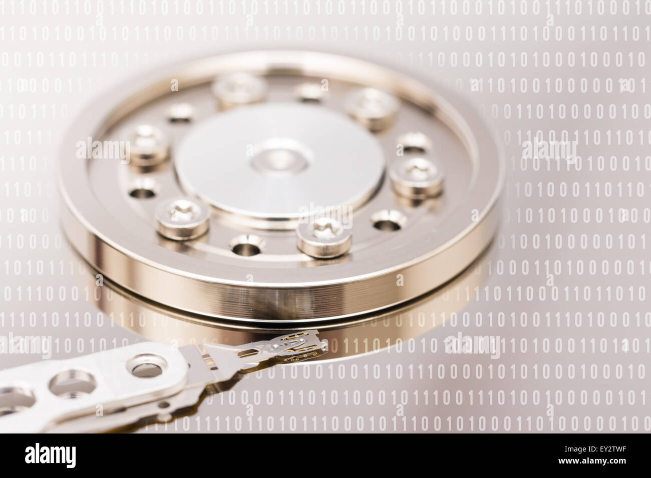 Computer Hard Disk Drive Internals And Binary Number Code Stock Photo