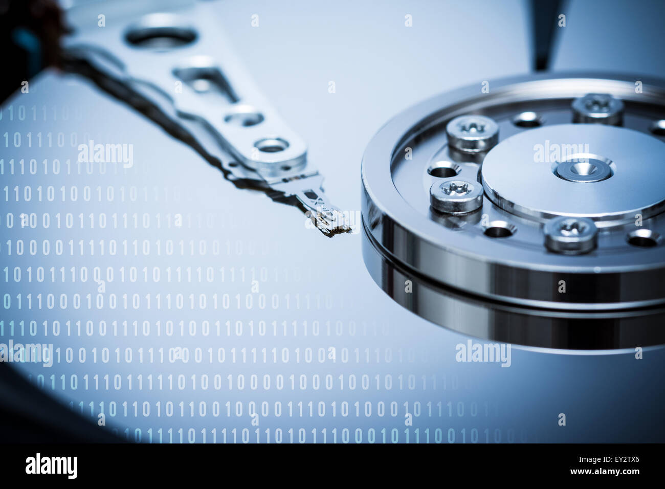 Computer Hard Disk Drive Internals And Binary Number Code Stock Photo