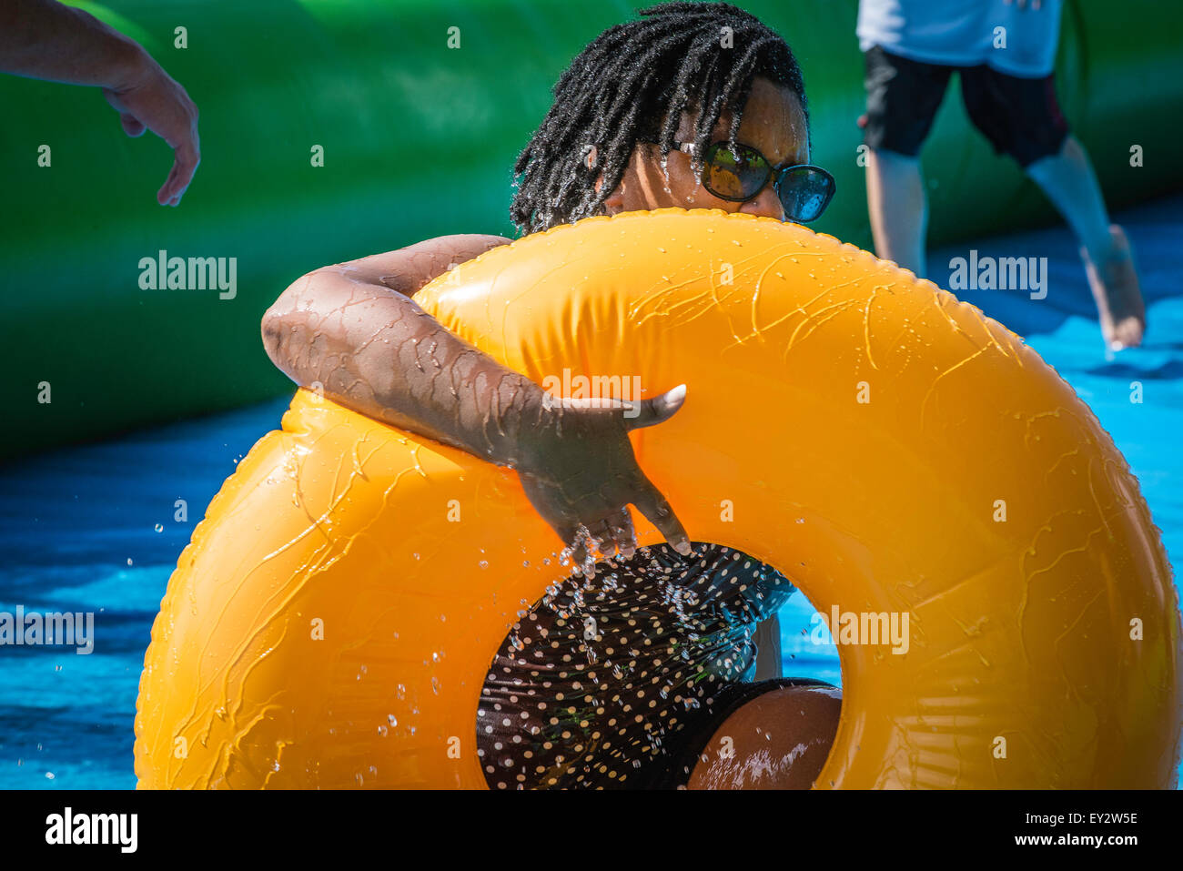 Slide the City, summer event water slide. Fun time during hot, humid