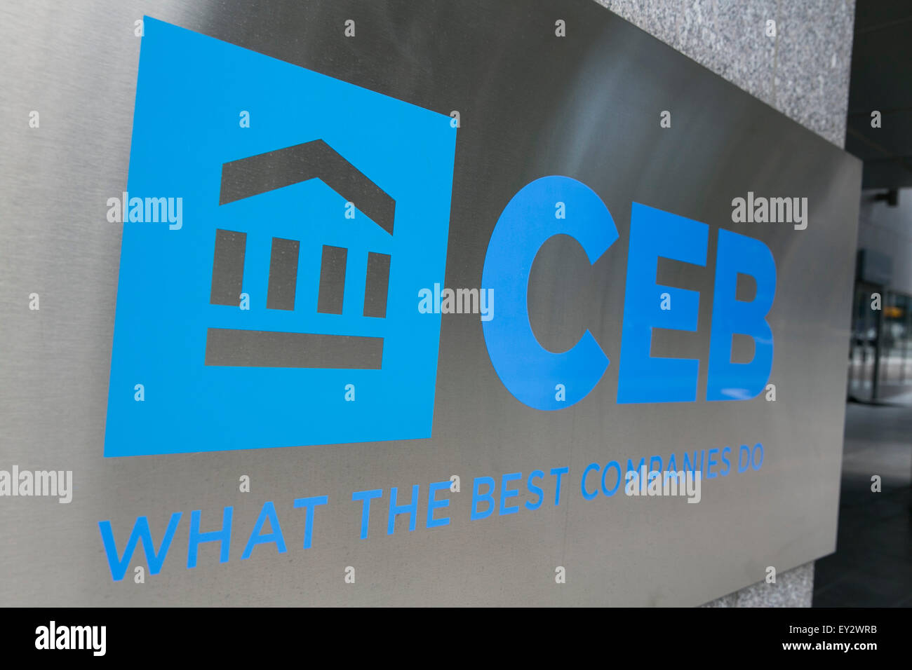 A logo sign outside of the headquarters of the Corporate Executive Board (CEB) in Arlington, Virginia on July 12, 2015. Stock Photo