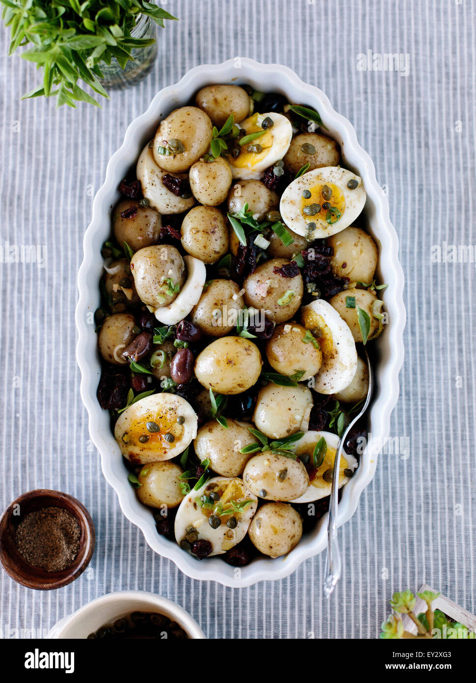 Baby Potatoes with SunDried Tomatoes and Caper Dressing displayed in a