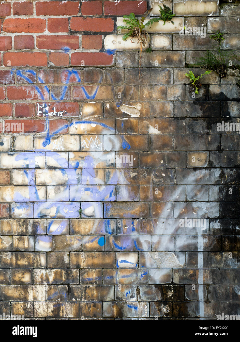 Graffiti on old brickwork Stock Photo