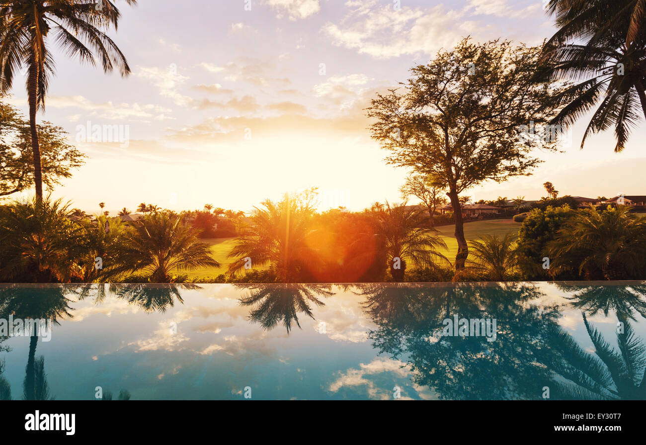 Beautiful Luxury Home with Swimming Pool at Sunset Stock Photo