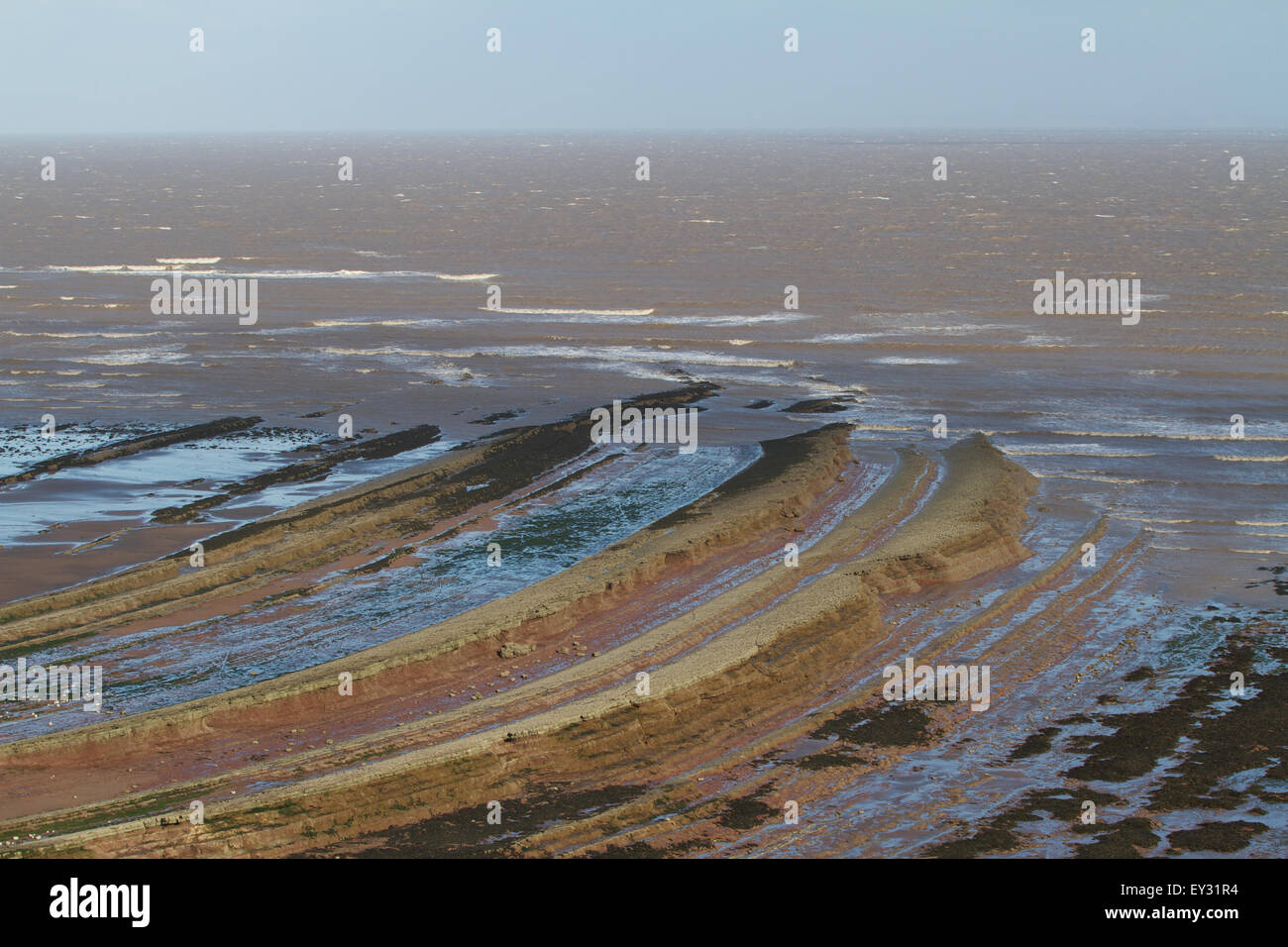 Rock formations at low tide. Somerset. Bristol Channel. UK Stock Photo -  Alamy
