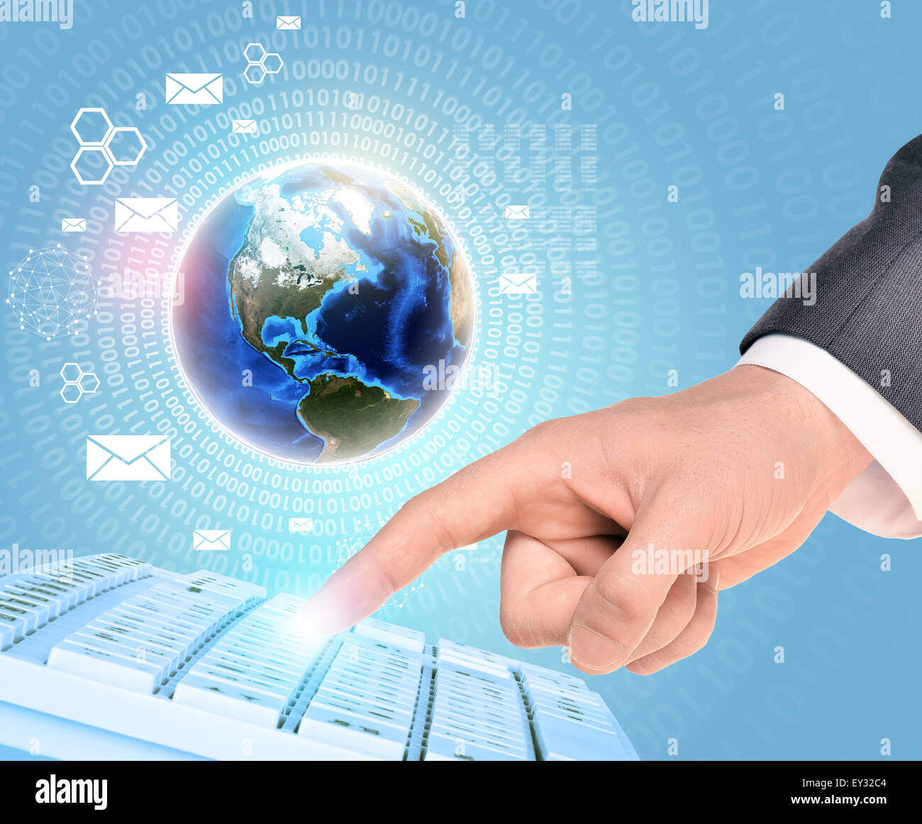 Earth and businessmans hand touching keyboard Stock Photo