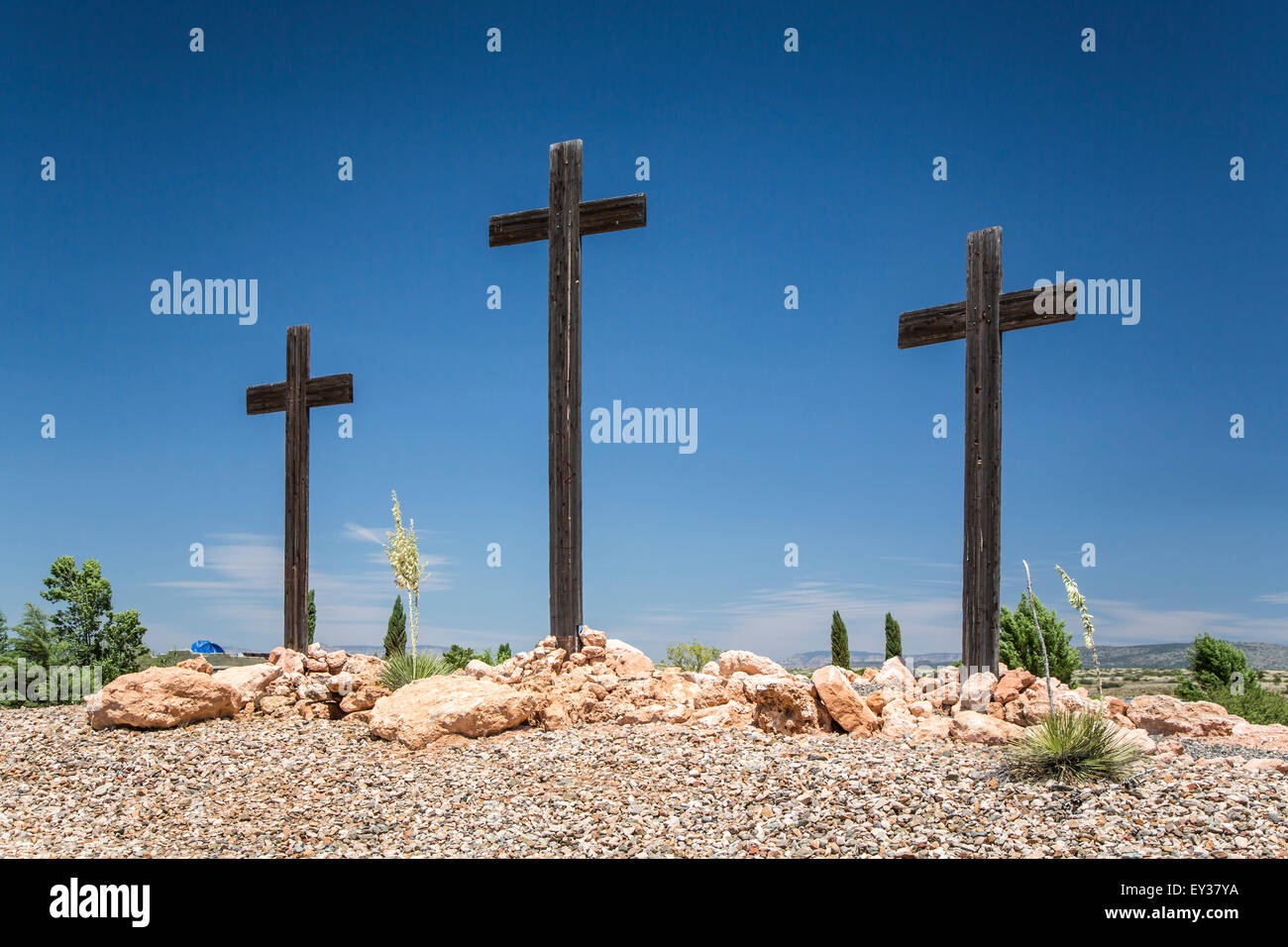 Three wooden crosses at the Immaculate Conception Catholic Church in Cottonwood, Arizona, USA. Stock Photo