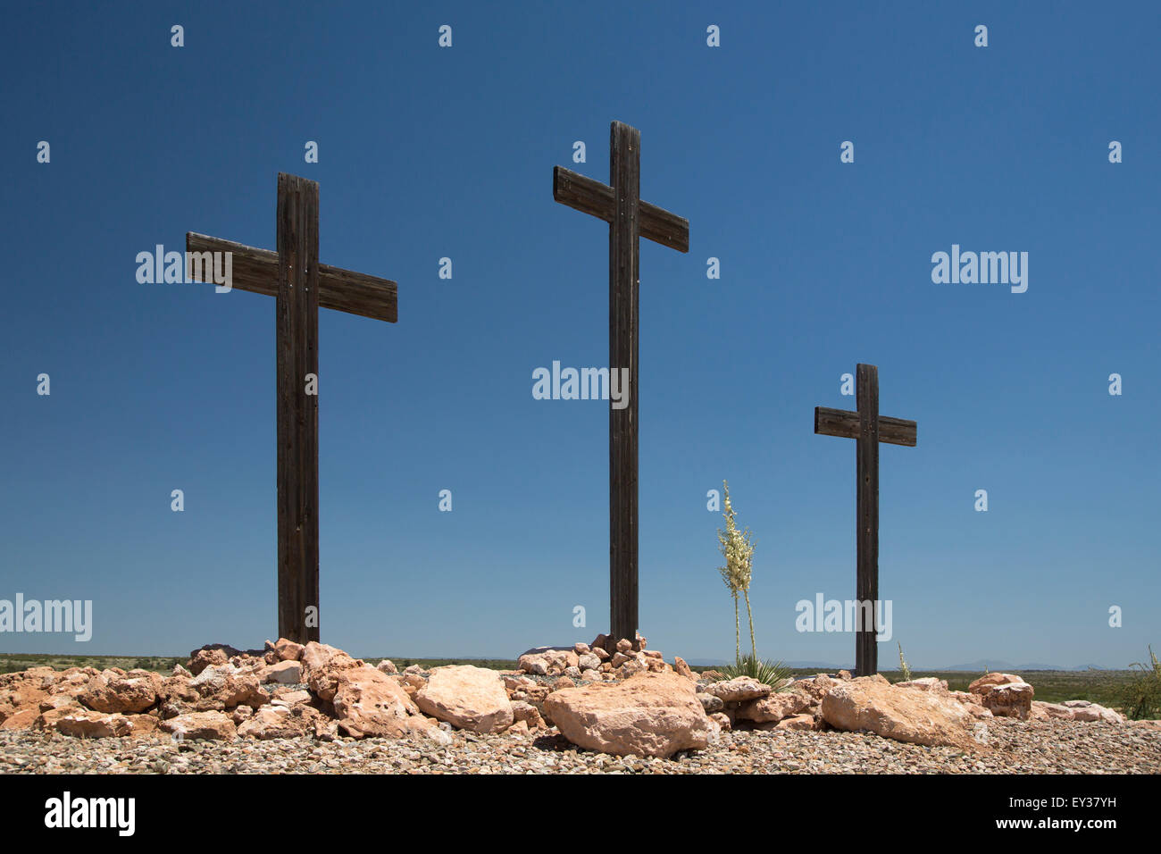 Three wooden crosses at the Immaculate Conception Catholic Church in Cottonwood, Arizona, USA. Stock Photo