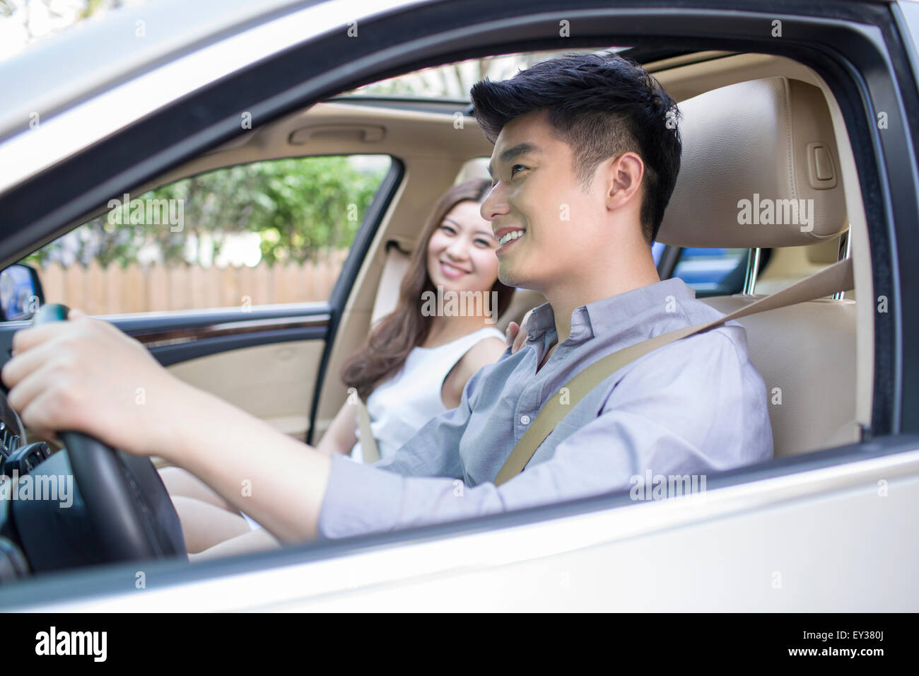 Asian couple sitting in car hi-res stock photography and images - Alamy