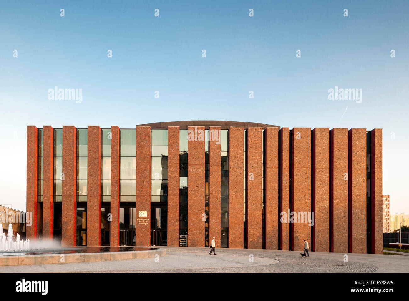 Front elevation of building with water features and public square. National Polish Radio Symphony Orchestra (NOSPR), Katowice, P Stock Photo