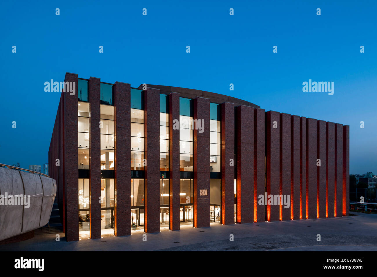 Building elevation at night. National Polish Radio Symphony Orchestra (NOSPR), Katowice, Poland. Architect: Konior Studio , 2014 Stock Photo