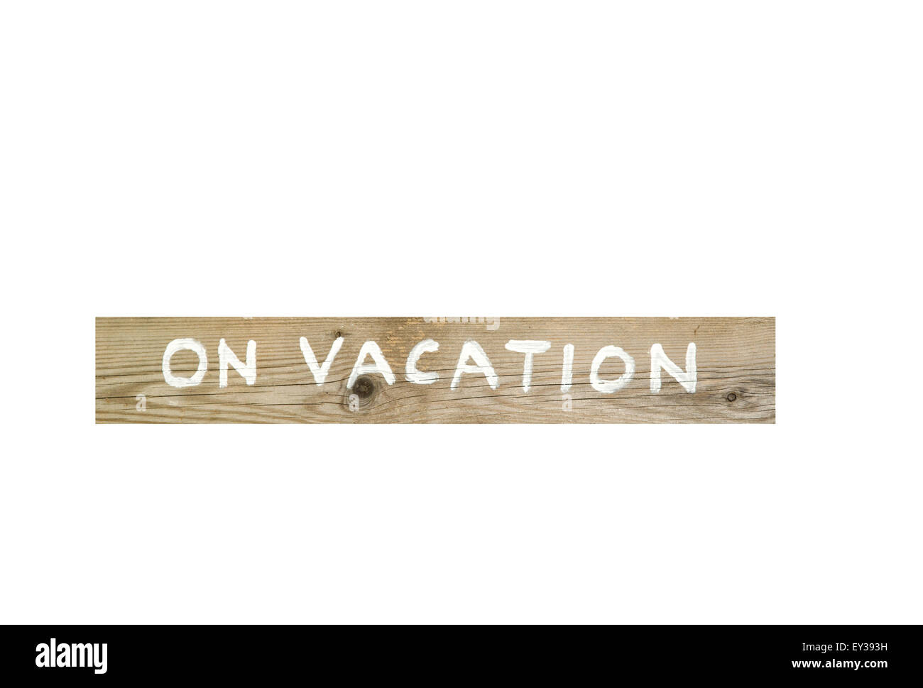 On vacation wooden sign isolated at white Stock Photo