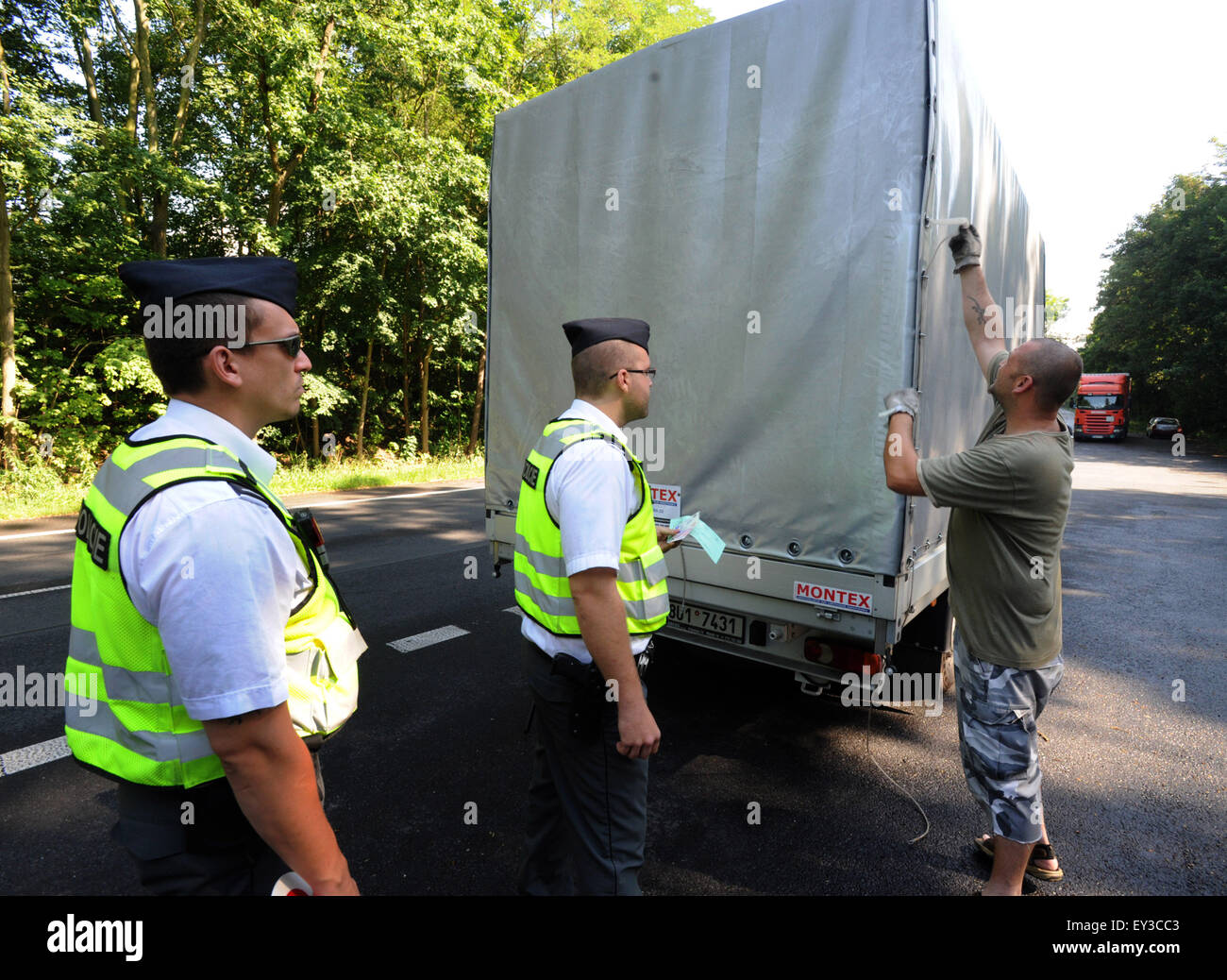 Czech foreign police and traffic police raid during the security action focused mainly on illegal migration in Chlumec, Usti Region, Czech Republic, on July 21, 2015. (CTK Photo/Libor Zavoral) Stock Photo