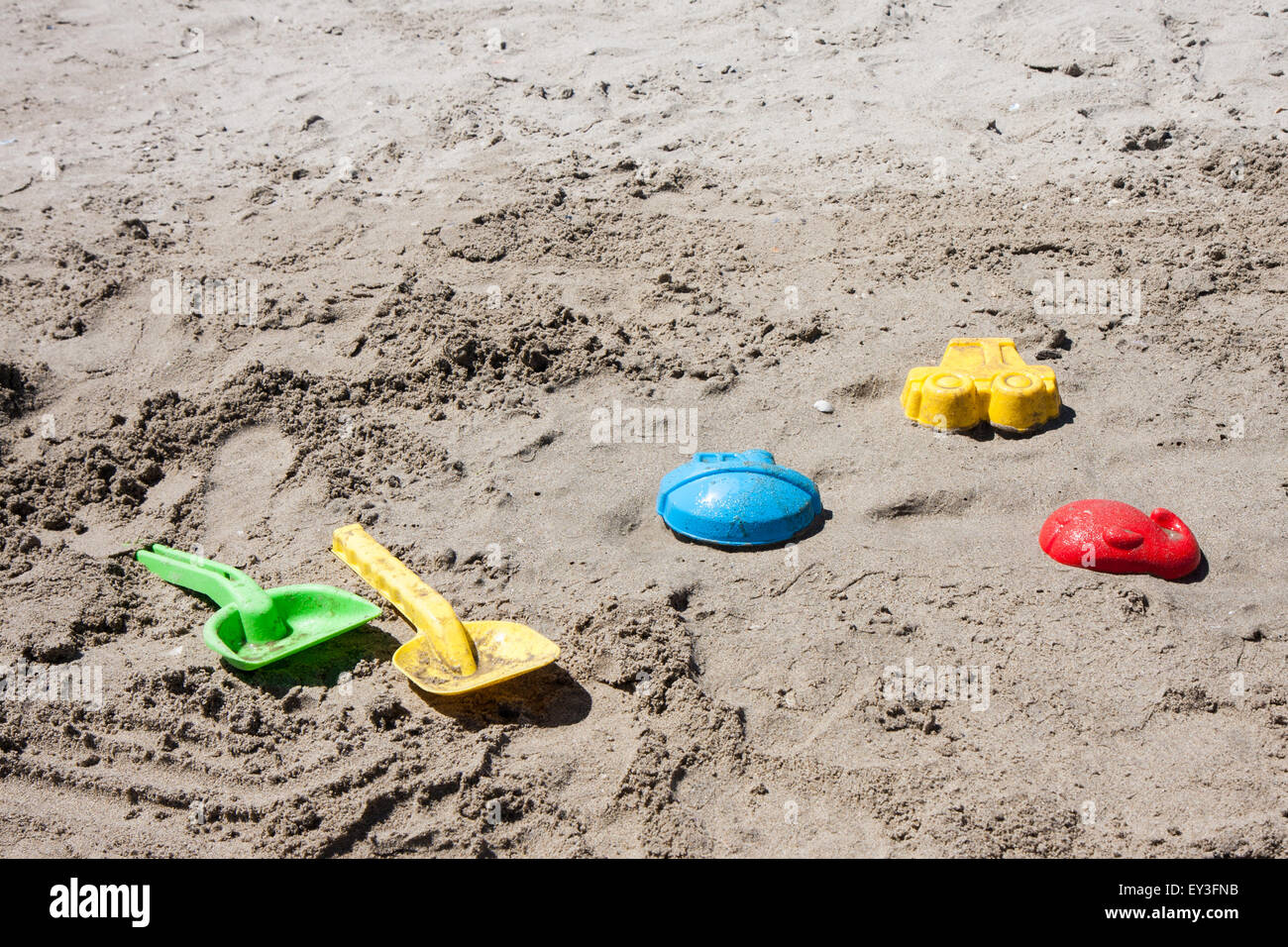 beach toys in the sand and sea Cesenatico Italy Stock Photo