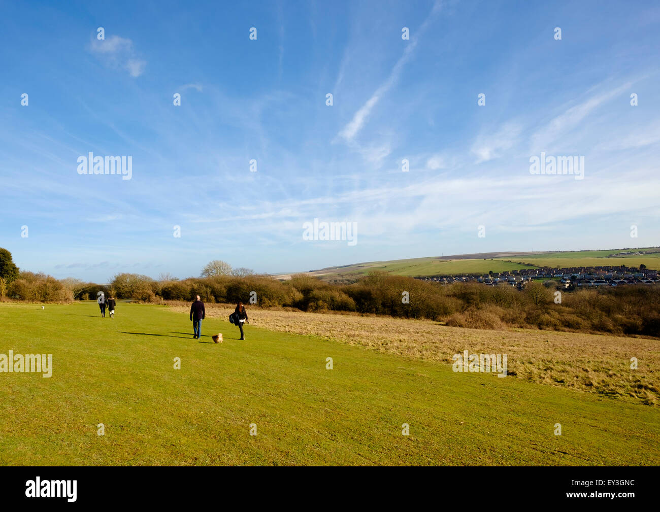 Walkers on the hills of Wild Park in the South Downs National Park with
