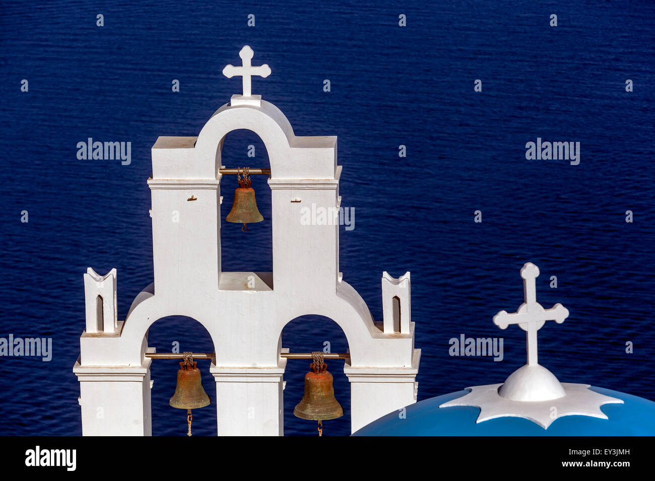 Blue dome and bell tower, Famous Agioi Theodori church in Firostefani Santorini, Cyclades Islands, Aegean Sea, Greece Stock Photo