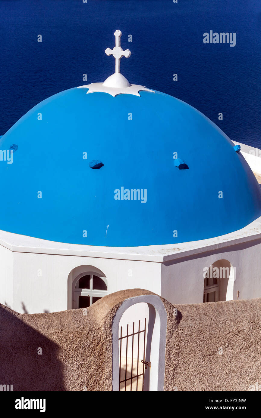 Blue dome and bell tower, Famous Agioi Theodori church in Firostefani Santorini, Cyclades Islands, Aegean Sea, Greece Stock Photo