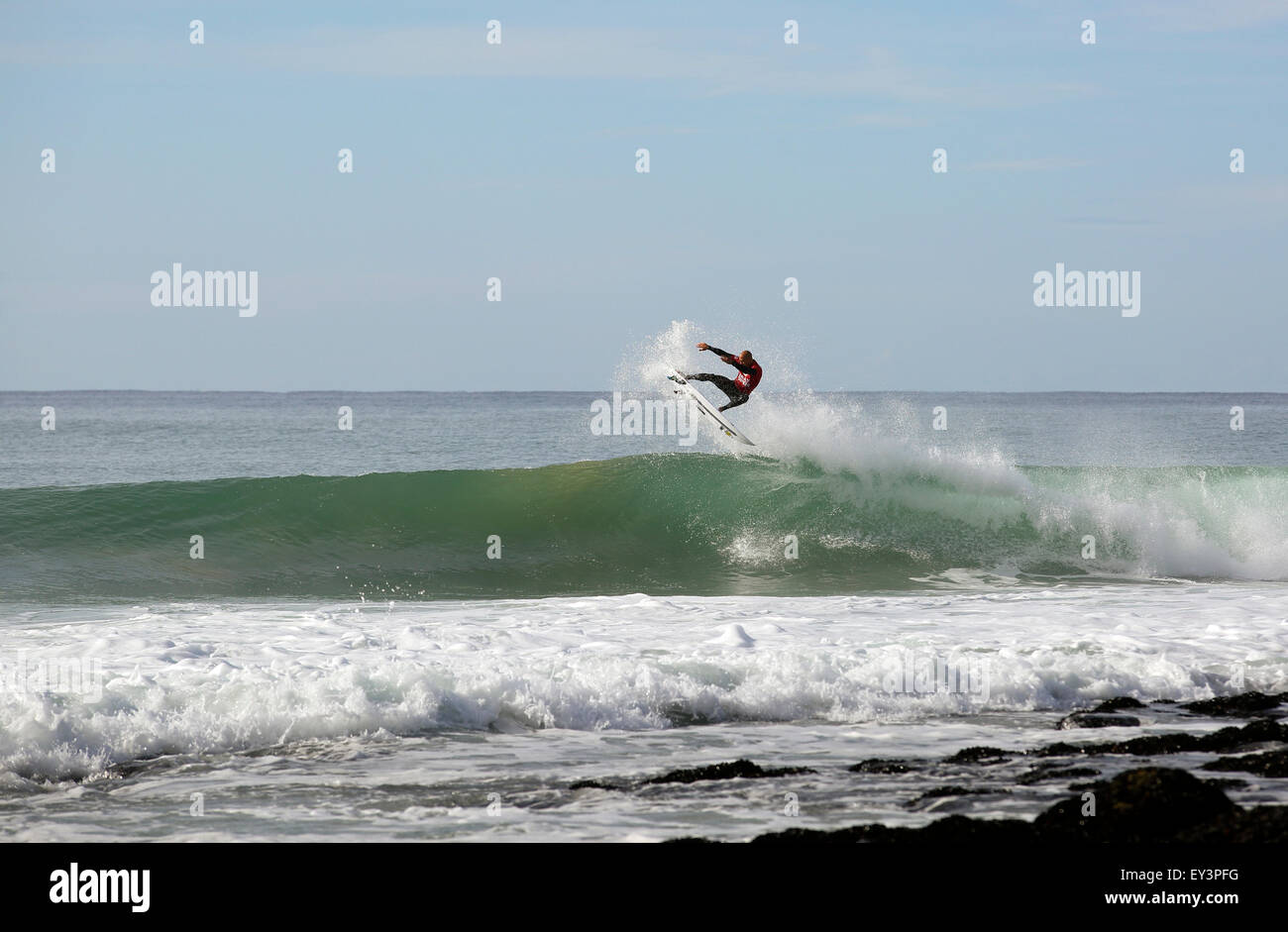 Professional surfer Kelly Slater does an aerial during competition at