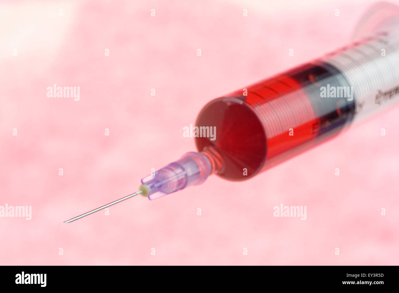 Close up of a hypodermic syringe and needle. Logos removed Stock Photo