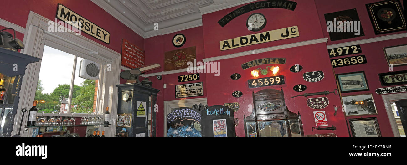 Interior of Stalybridge Station Buffet Bar - Showing old station signs Mossley & Aldam Jc Stock Photo