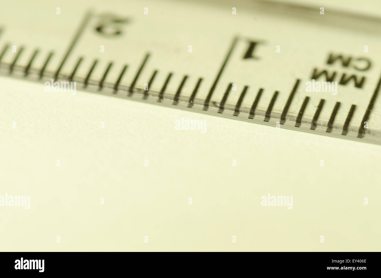 transparent ruler macro on paper background Stock Photo - Alamy