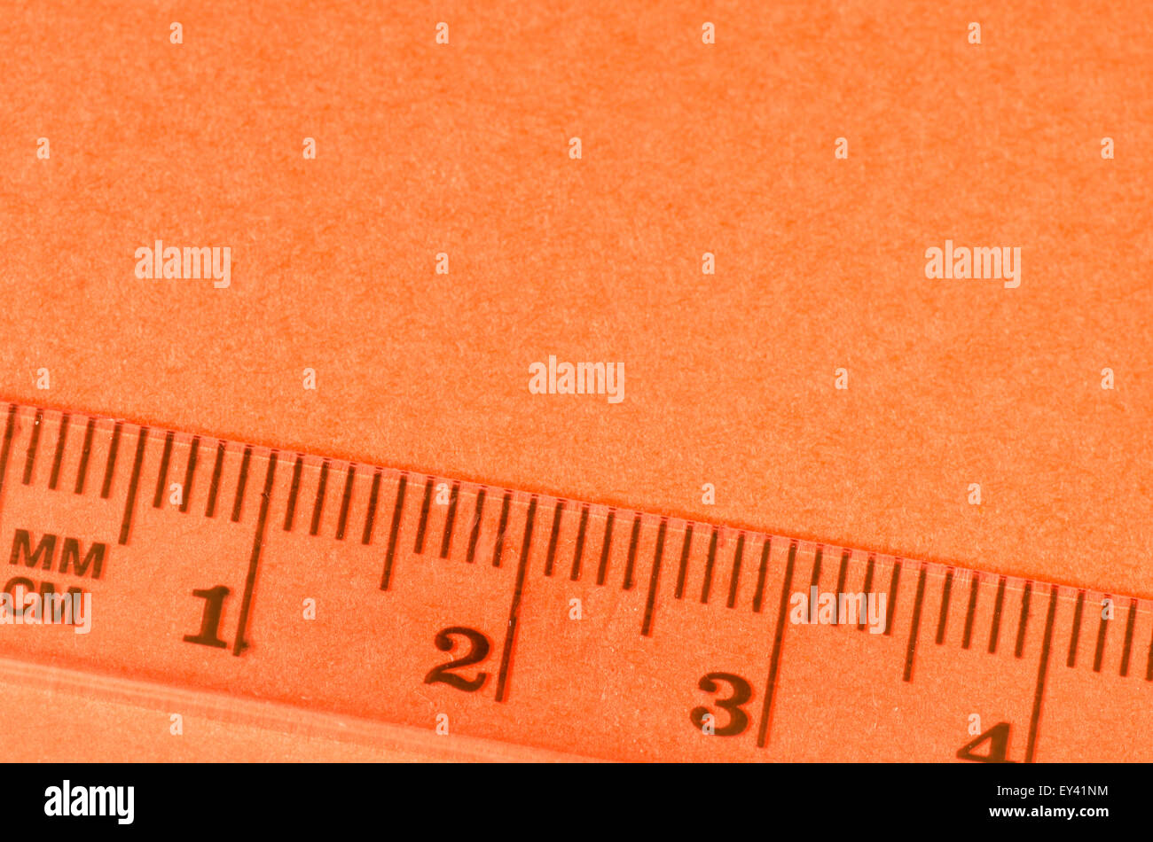 transparent ruler macro on paper background Stock Photo - Alamy