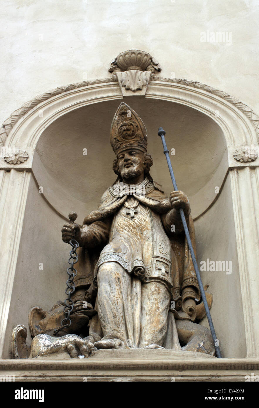 Religious Sculpture on a building in Male Strana in Prague. Stock Photo