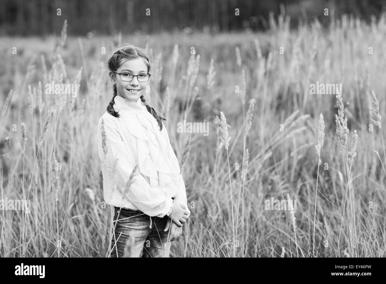 Adorable girl in glasses Stock Photo