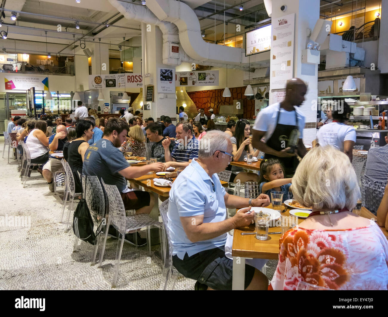 Diners at restaurant, Eataly Italian Marketplace, NYC Stock Photo
