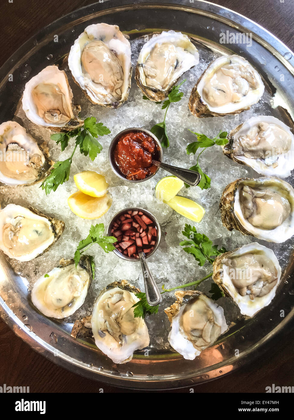 Raw Oysters on the Halfshell, Gourmet Restaurant Dining, USA Stock Photo