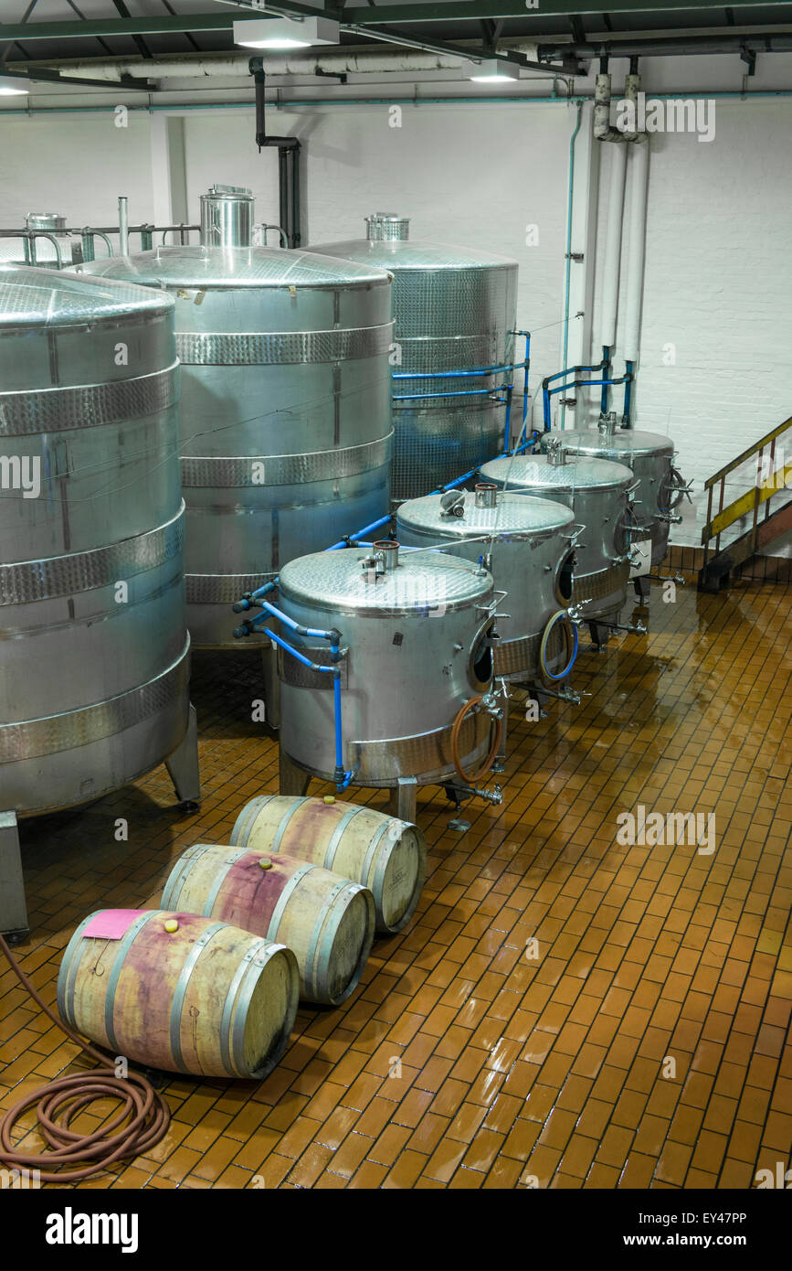 Stainless steel chilling tanks and oak barrels at Groot Constantia wine