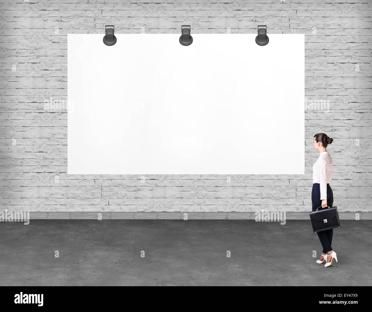 Elegant business woman looking at banner. Stock Photo