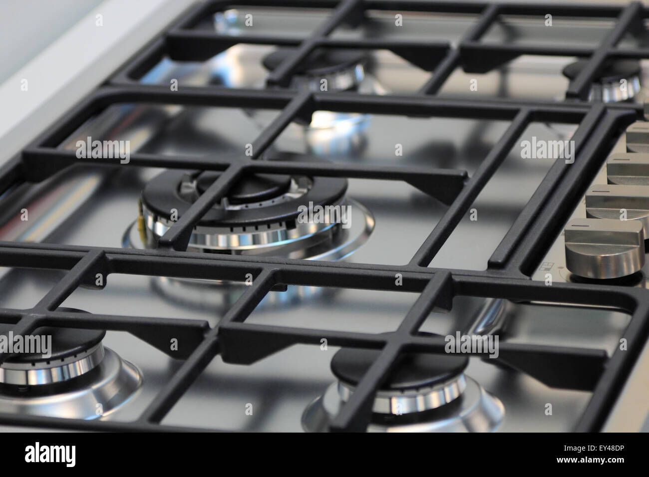 The upper part of gas cooking range. Stock Photo