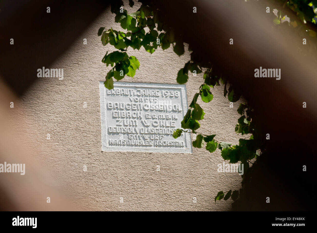 An inscription that reads 'Zum Wohle deutsch. Volksgenossen.' (lit. For the good of German [sic]. National comrades.) is pictured on a residential building in Nuremberg, Germany, 21 July 2015. The inscription on the building had gone unnoticed for decades. Photo: DANIEL KARMANN/dpa Stock Photo