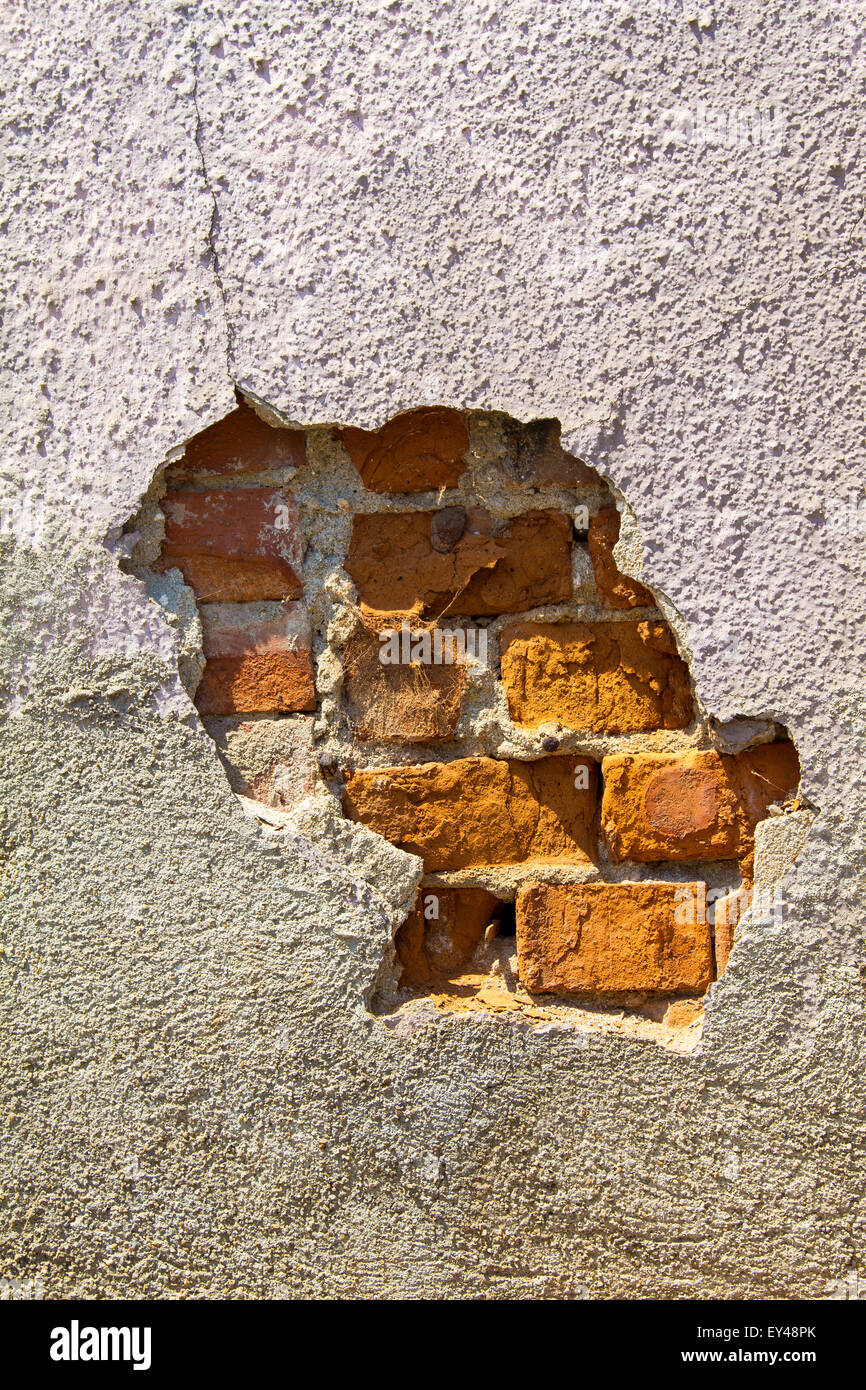 Brick wall, paint peel off Stock Photo - Alamy
