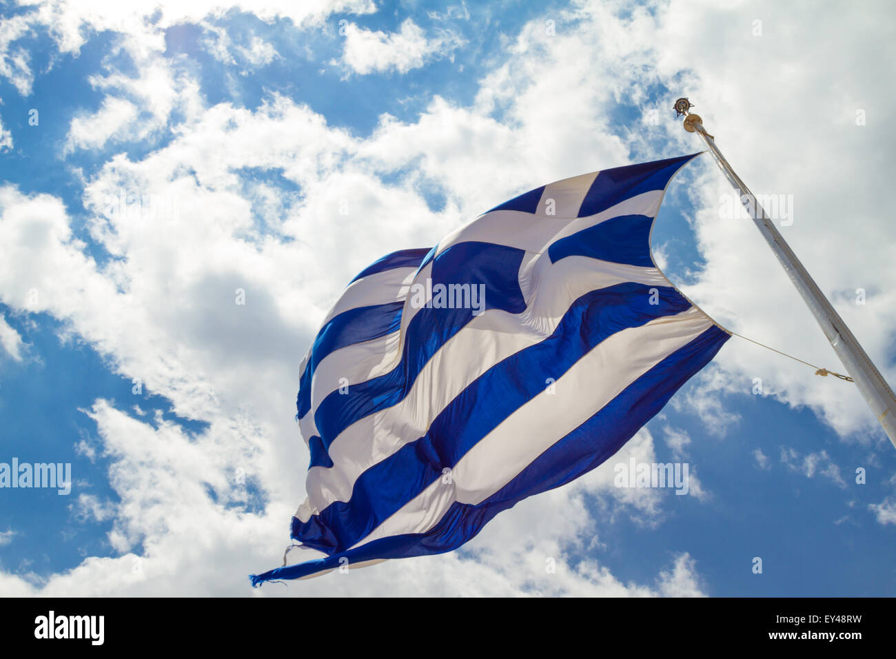 Greek flag waving in the sky Stock Photo