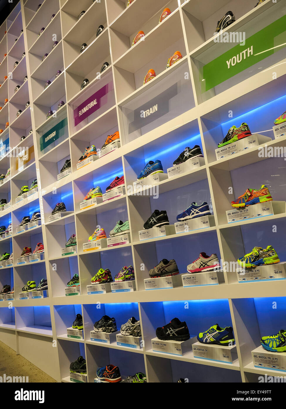 Asics Store-Times Square,Floor to Ceiling Running Shoe Wall Display, NYC,  USA Stock Photo - Alamy