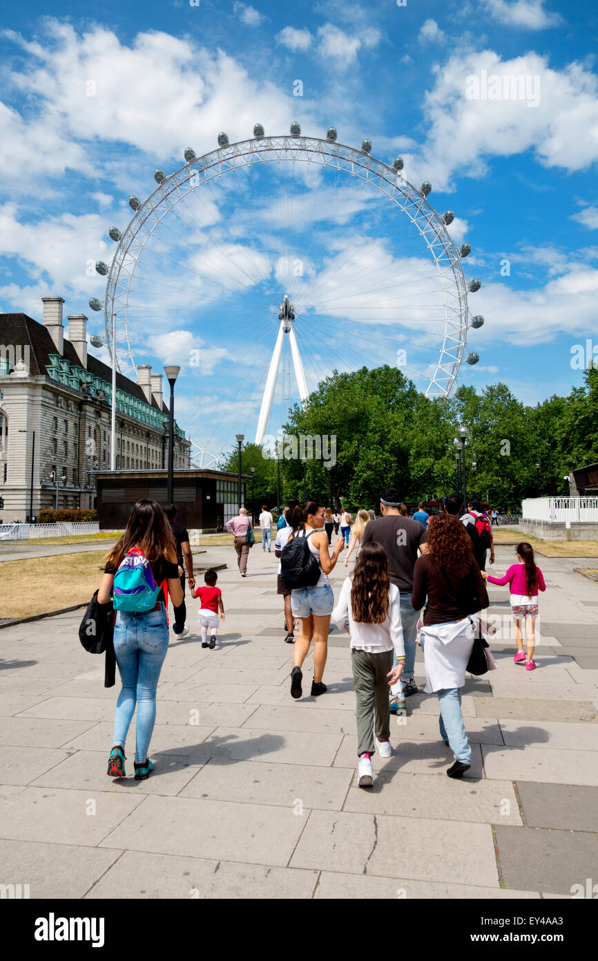 Tourists at the London Eye in the summer, central London, England UK Stock Photo
