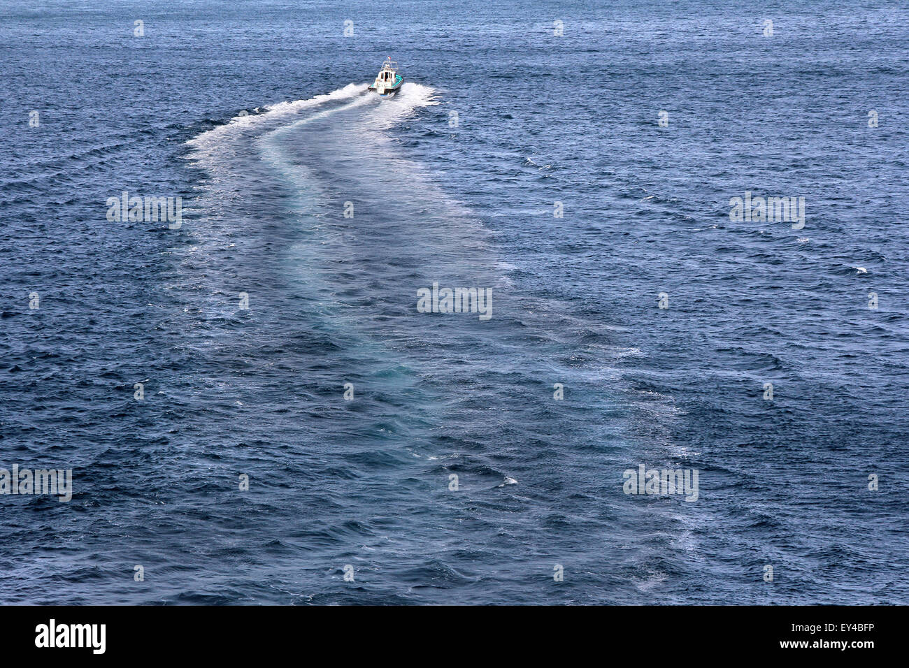 Speed boats and his trace on the blue sea Stock Photo - Alamy