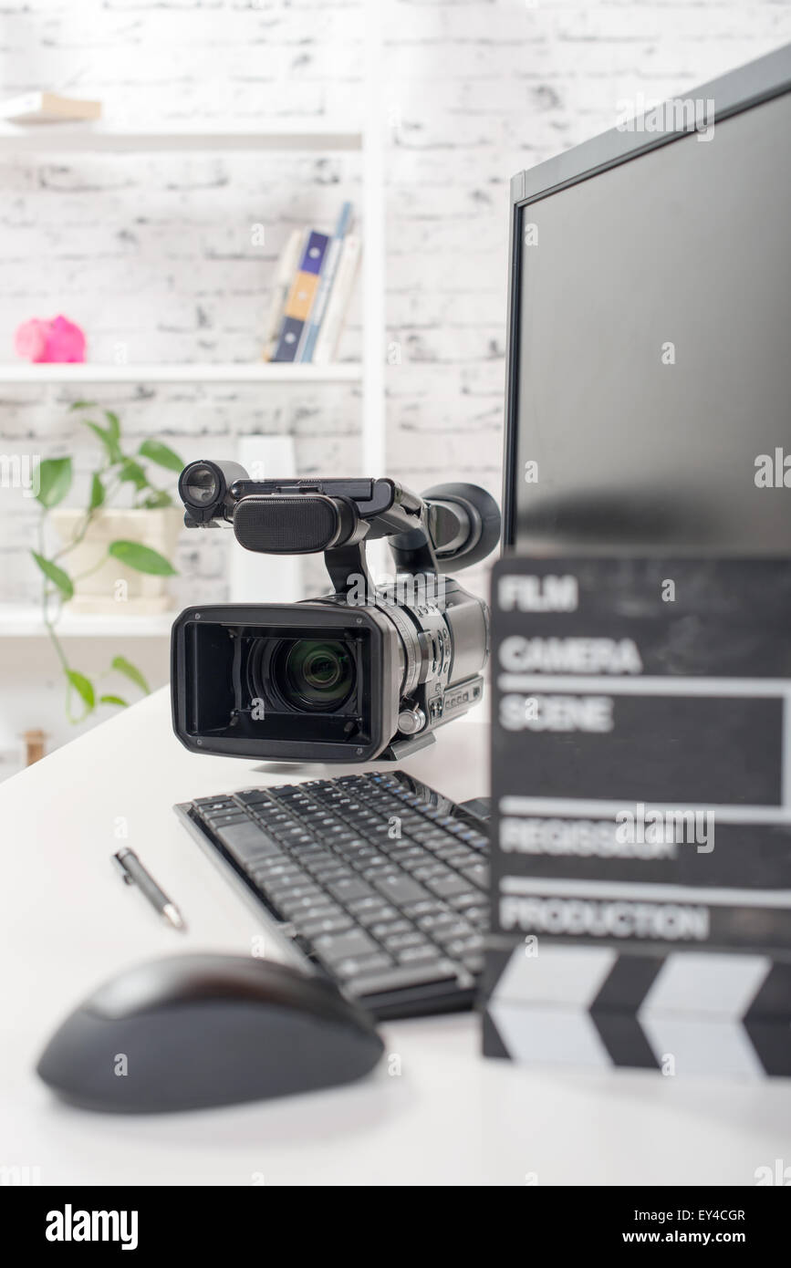 editing video computer and movie camera Stock Photo Alamy