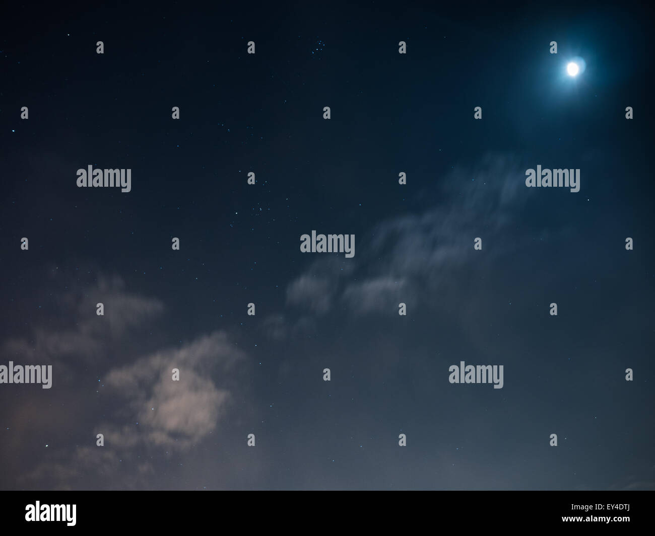 Night cloudy sky with stars and moon Stock Photo - Alamy