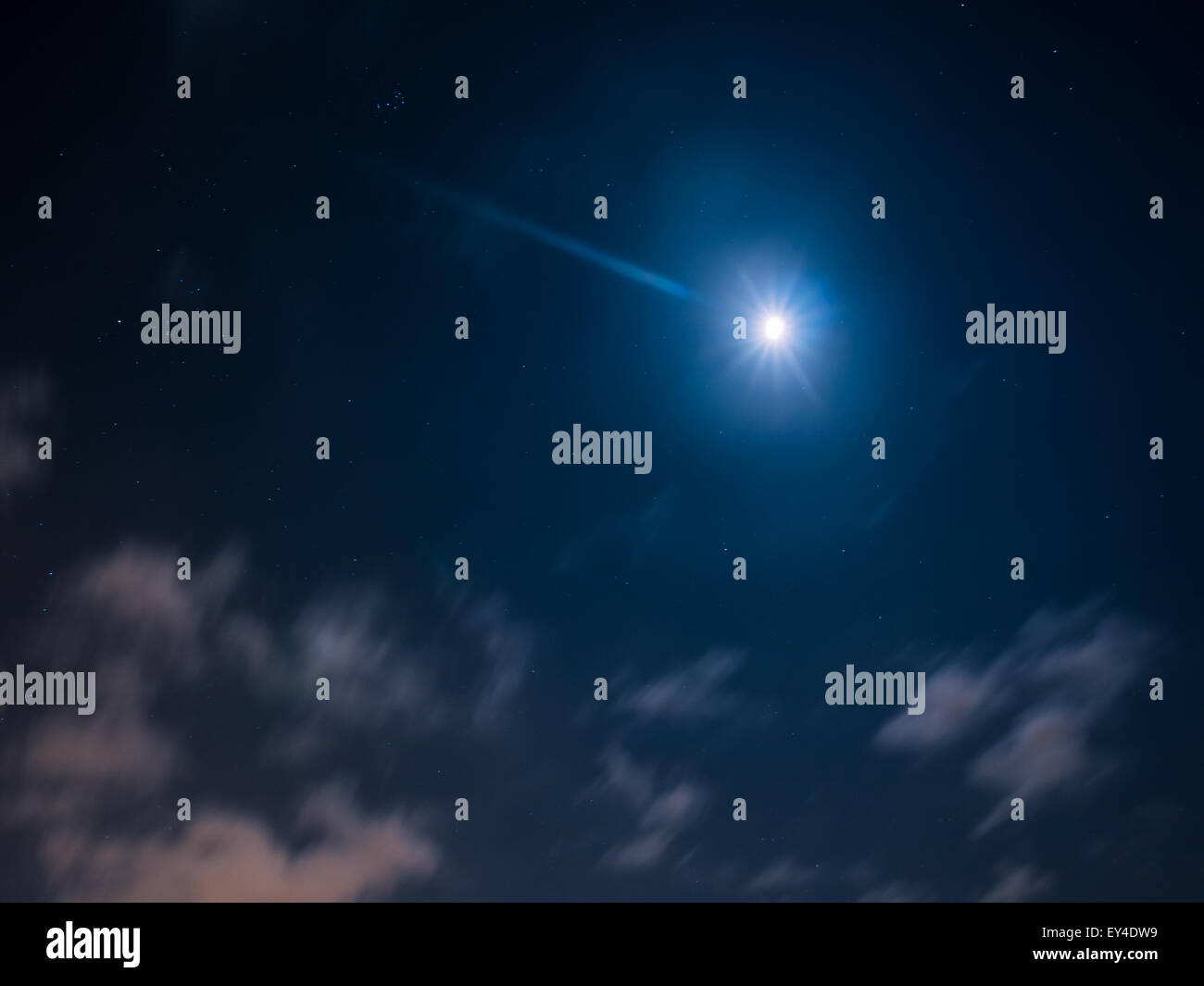Night cloudy sky with stars and moon Stock Photo - Alamy