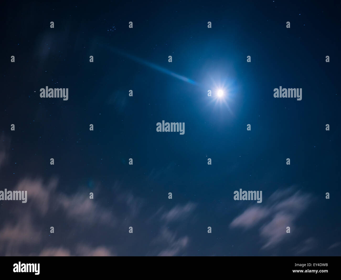 Night cloudy sky with stars and moon Stock Photo - Alamy