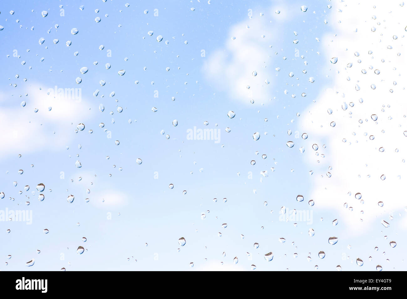 Drops of rain on glass, nature background. Stock Photo