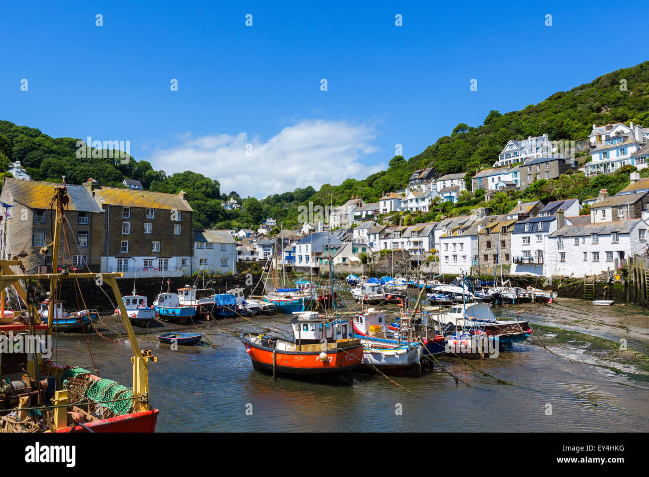 The harbour at low tide in the fishing village of Polperro, Cornwall, England, UK Stock Photo